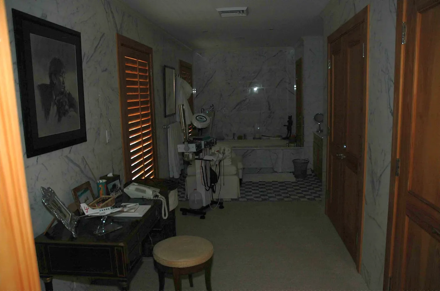 Bagno: GX-283 - Marble-walled room with wooden shutters vanity medical equipment and a checkered