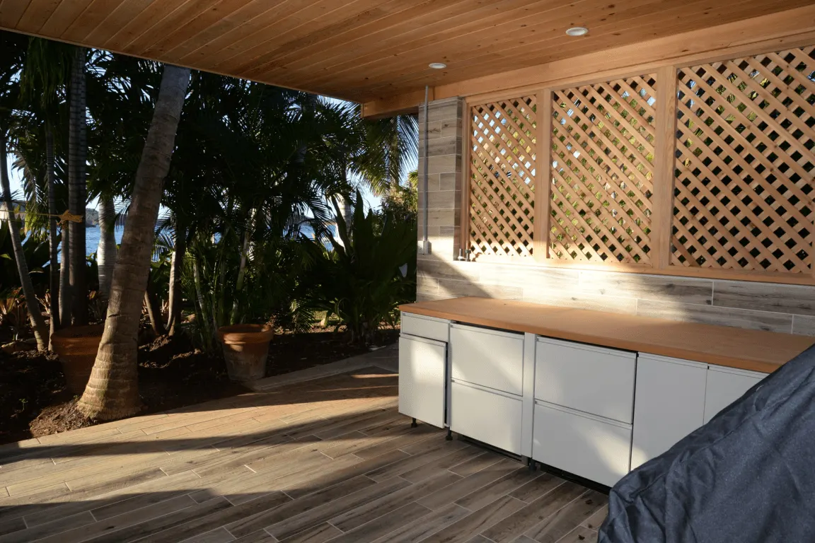 Кухня: EFTA00002810 - Wooden lattice wall and countertop white cabinets wooden floor palm trees s
