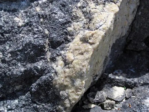 Slab surface: Dolomitized marble in marble (Gouverneur Marble, Mesoproterozoic, ~1.1 Ga; Route 11 roadcu