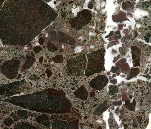Slab surface: Italian Red Antique Marble (tectonic marble breccia; Genoa, Liguria, Italy)