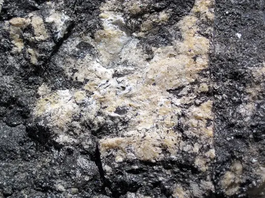 Slab surface: Dolomitized marble in marble (Gouverneur Marble, Mesoproterozoic, ~1.1 Ga; Route 11 roadcu